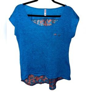 Woman’s Short Sleeve High Low Top
